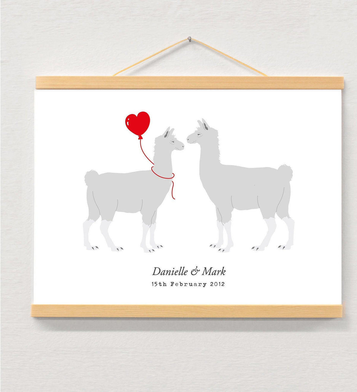 Llama couple personalised print displayed in a wooden magnetic hanger