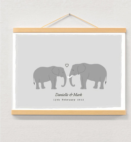 Elephant couple personalised print displayed in a wooden magnetic hanger