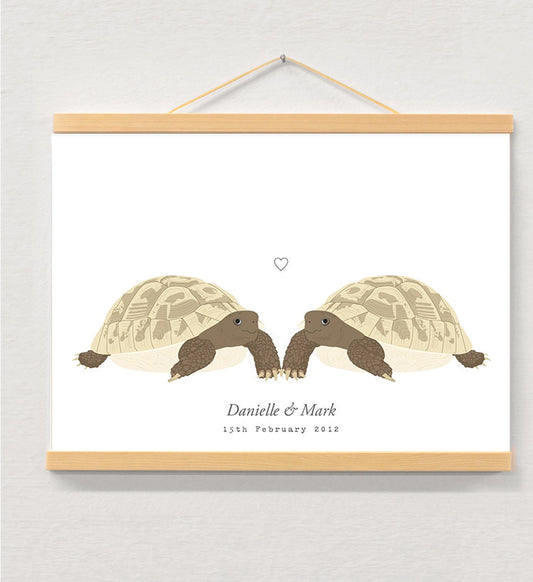Tortoise couple personalised print displayed in a wooden magnetic hanger