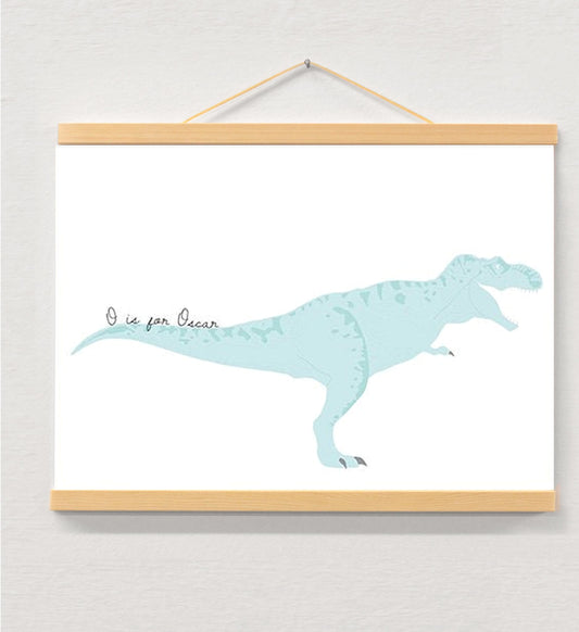 Nursery name print dinosaur displayed in a wooden magnetic hanger