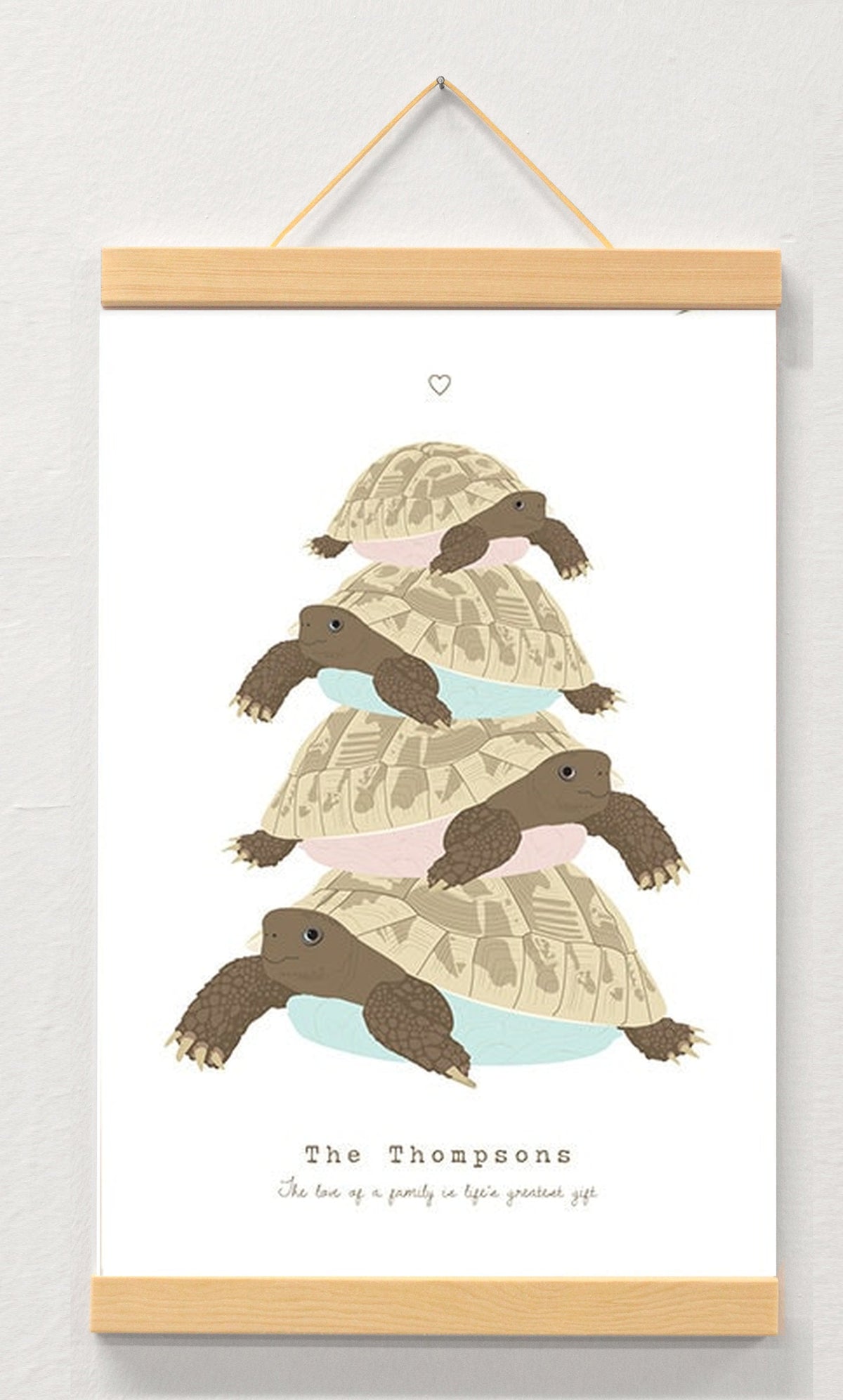 Tortoise Family Personalised Print, Custom Family Name Wall Art displayed in a wooden magnetic hanger