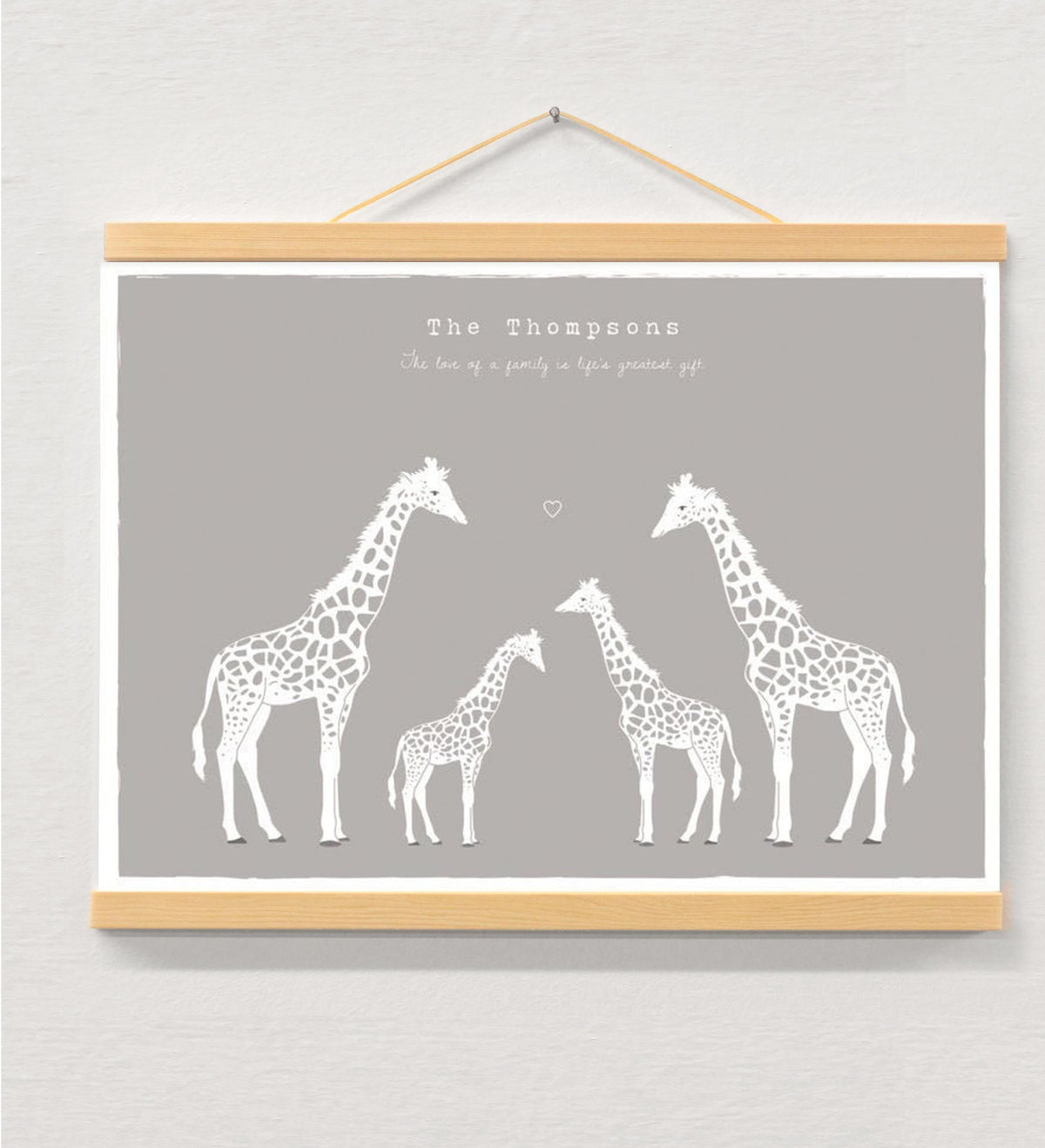 Giraffe Family Personalised Print, Custom Family Name Wall Art displayed in a wooden magnetic hanger