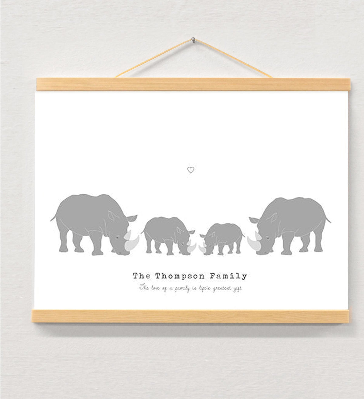 Personalised Family Print Rhino displayed in a wooden magnetic hanger