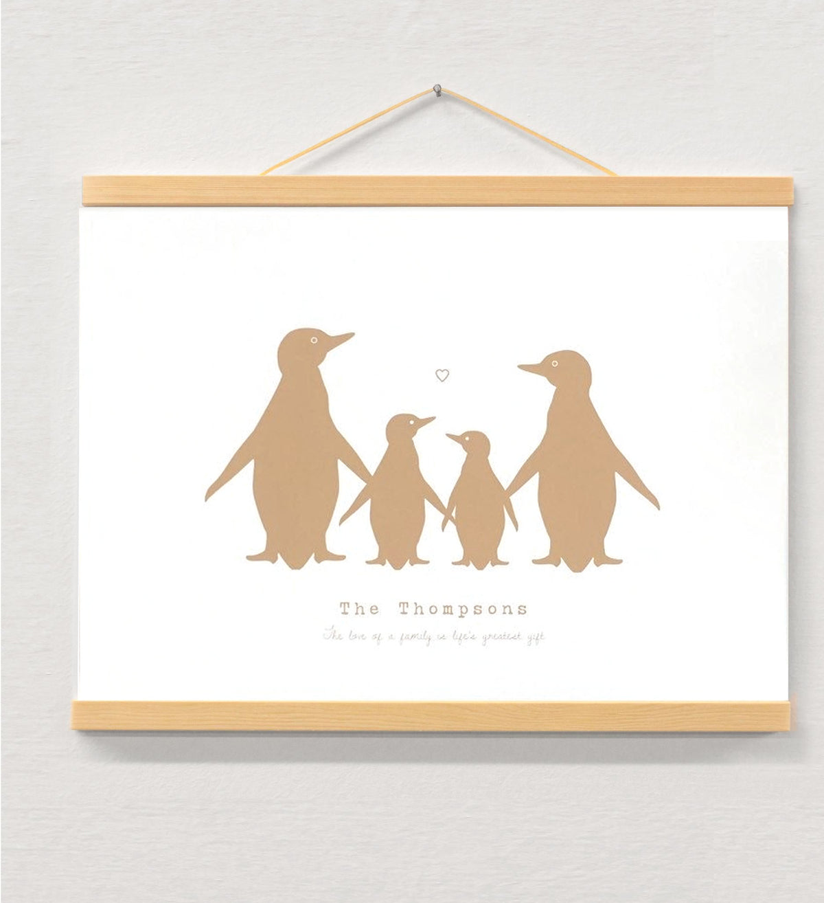 Penguin Personalised Family Print displayed in a wooden magnetic hanger
